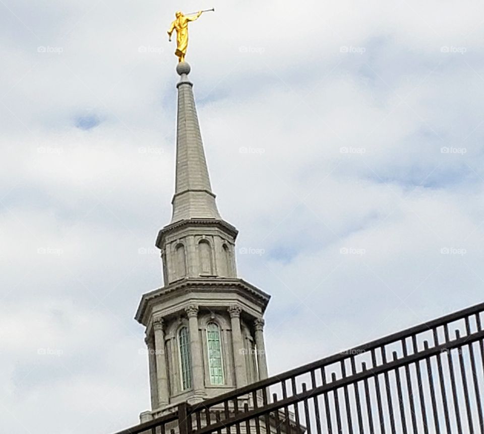 Gold Statue on Building Steeple