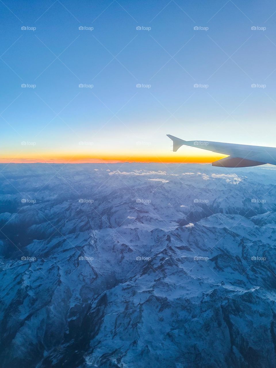 Snowy mountains from airplane