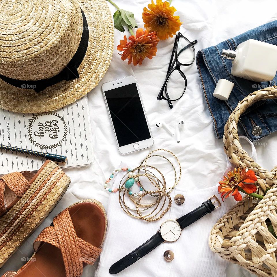 Summer flat lay photography with women accessories 