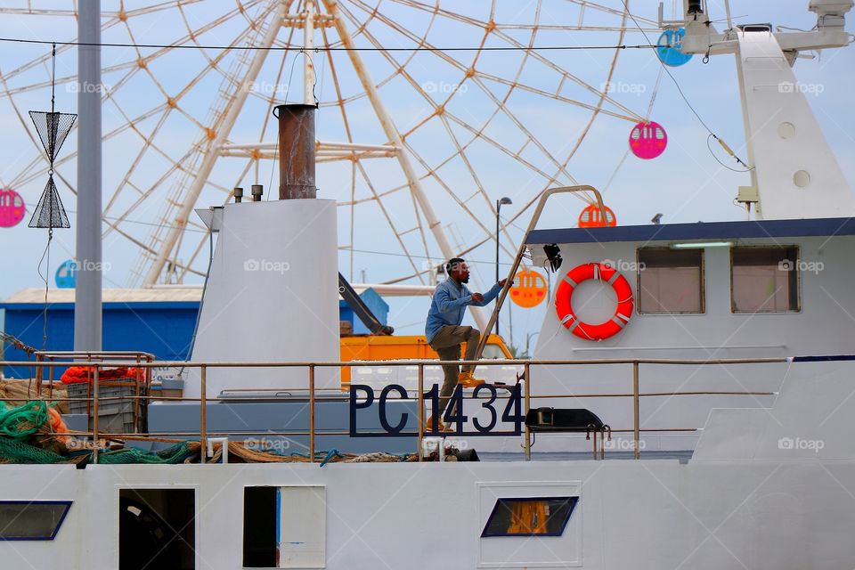 Ferris wheel fishing boat