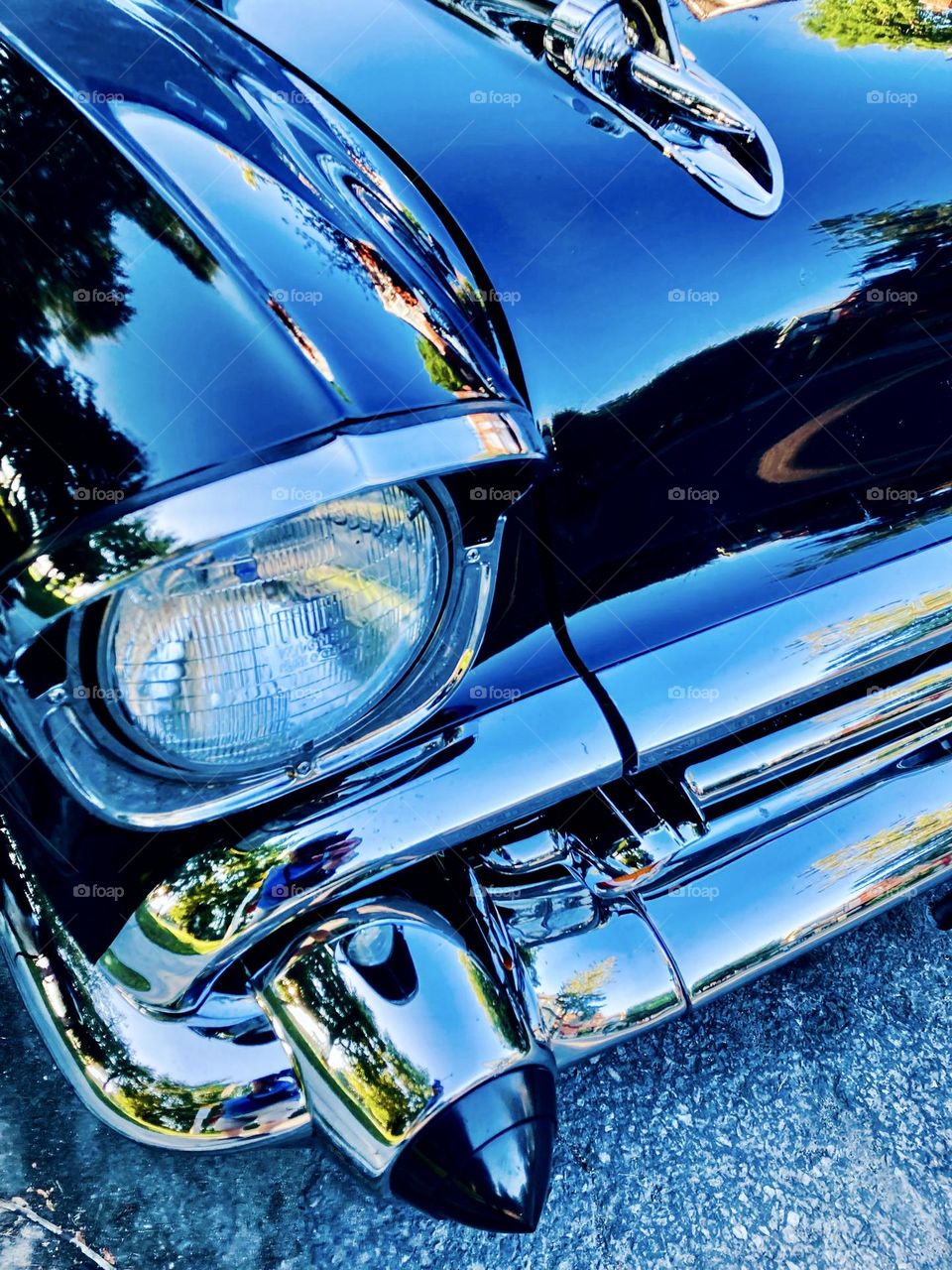 Front bumper of the driver side of a vintage 1957 Chevrolet Bel Air.