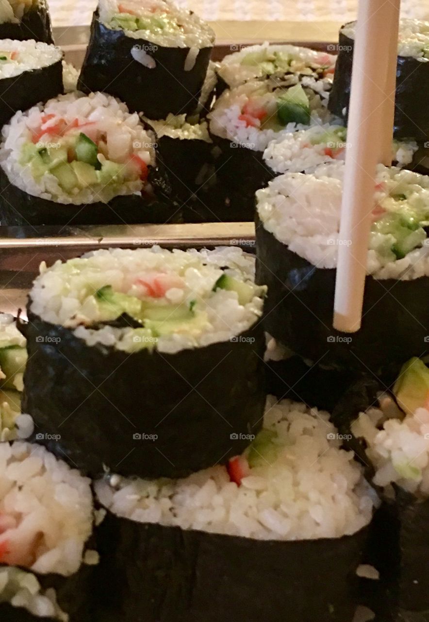 Sushi rolls Japanese Maki avocado, cucumber, crab