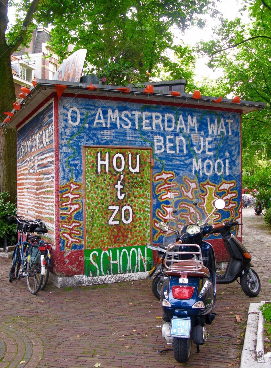 Graffiti Building surrounded by bikes in Amsterdam