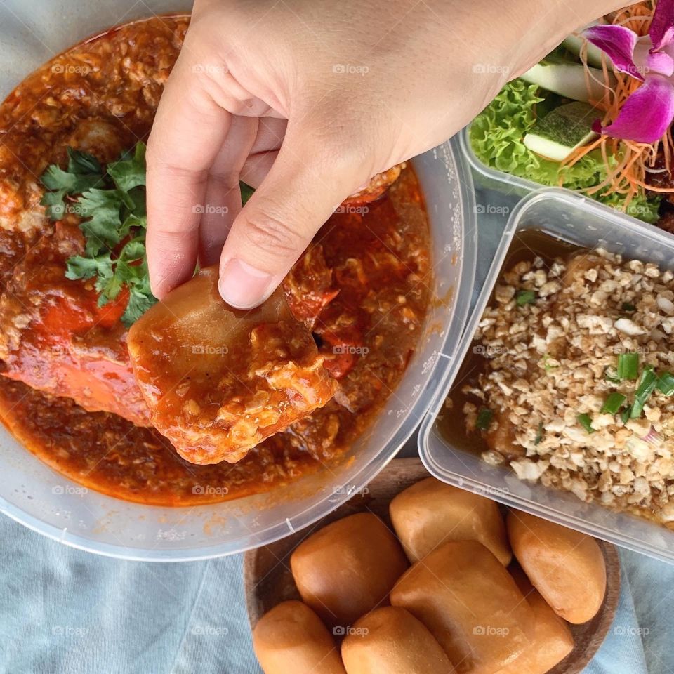 Asian local dishes in tze char style, Chilli crab, coffee pork ribs, caipo beancurd, broccoli with scallops and classic fried rice 