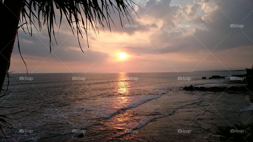Sunset in Bali. . A cliff side sunset in Bali Indonesia called "Tanah Lot" 