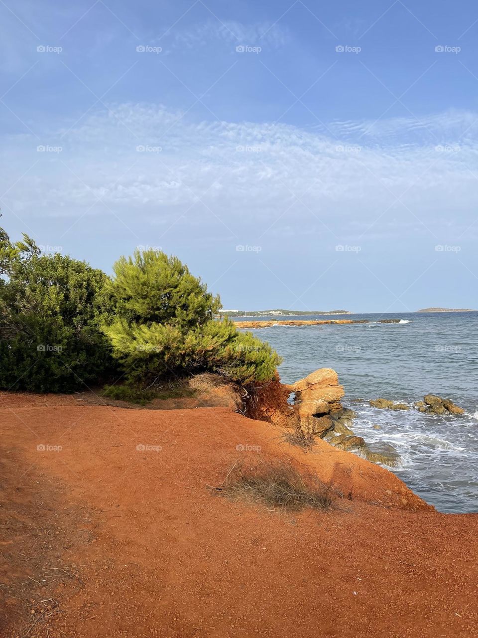 Red beach in Santa Eulalia des Riu, Eivissa, Ibiza, Spain, sea landscape 