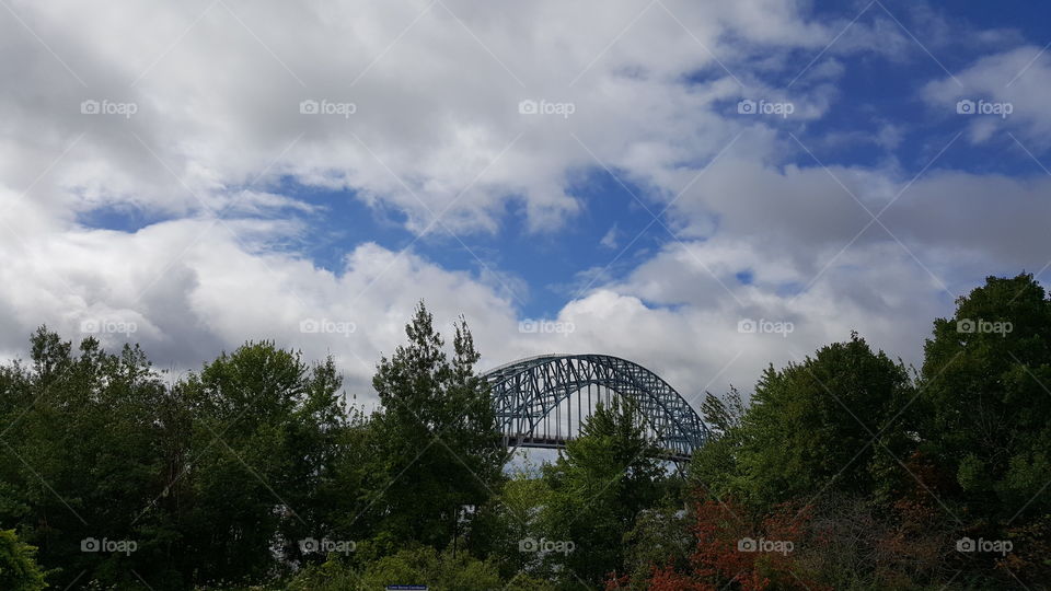bridge under a cloudy sky